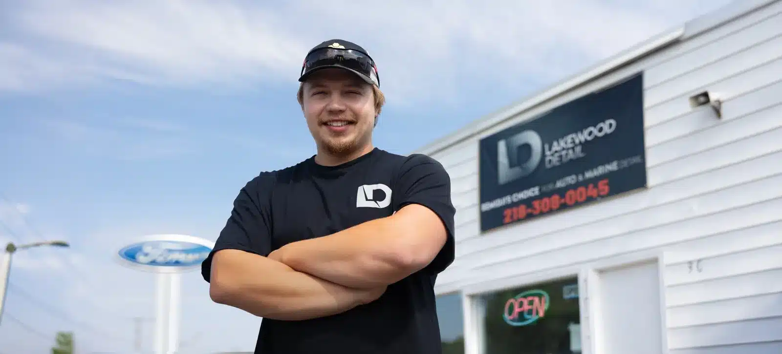 Lakewood Detail owner outside his auto detailing shop, social media content by Hatcher Digital