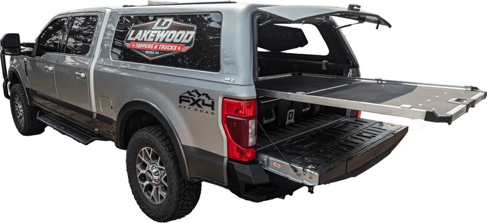 Lakewood Toppers & Trucks branded pickup showing visual identity design