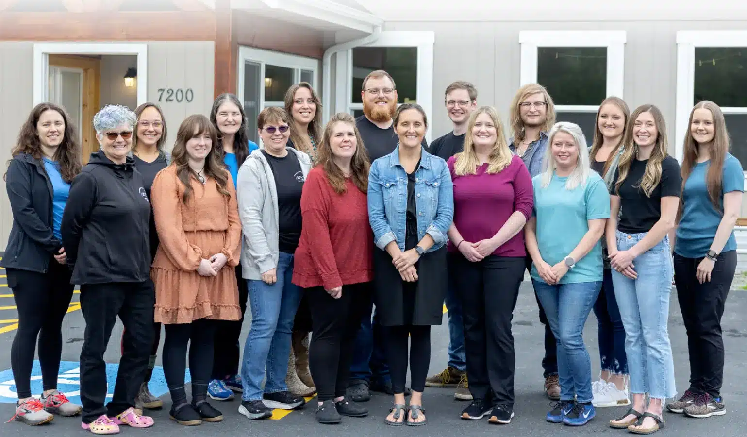 Large staff team photo outside the office, corporate photography in the Mat-Su Valley