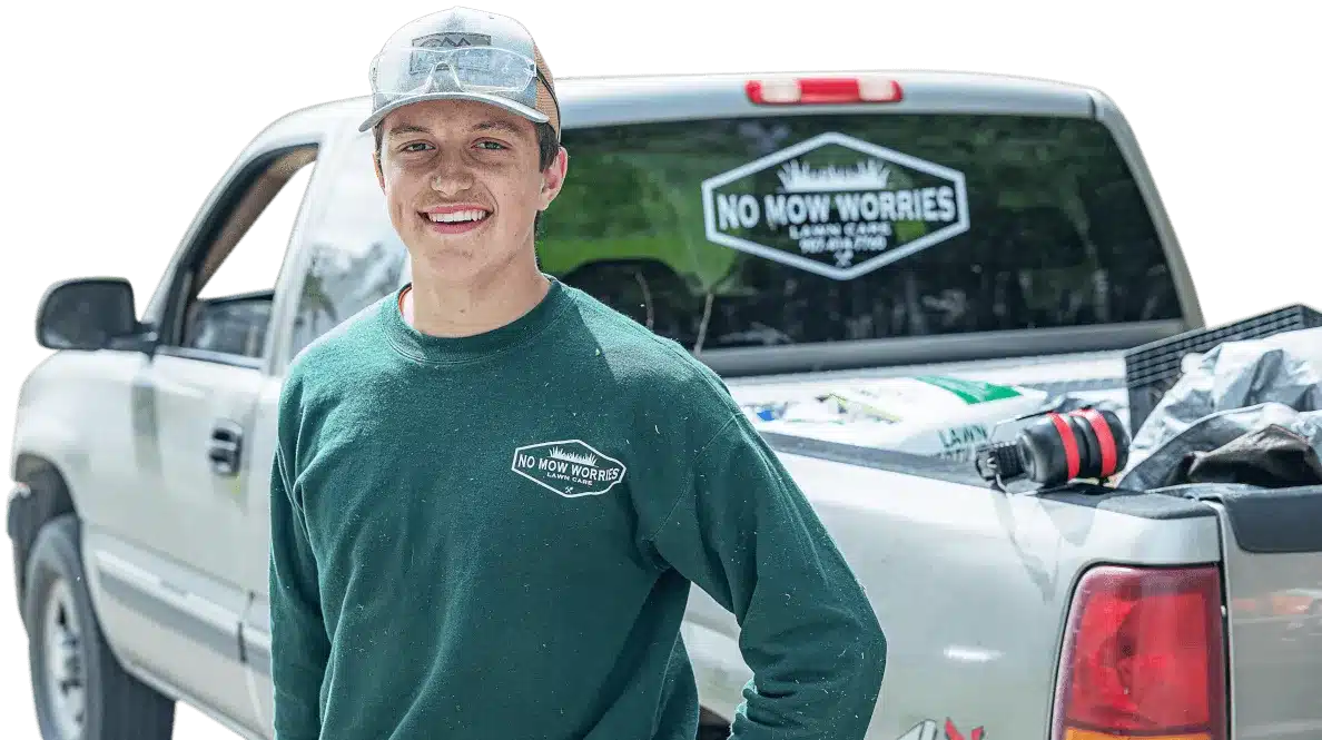No Mow Worries Lawn Care owner with truck, edited for social media by Hatcher Digital