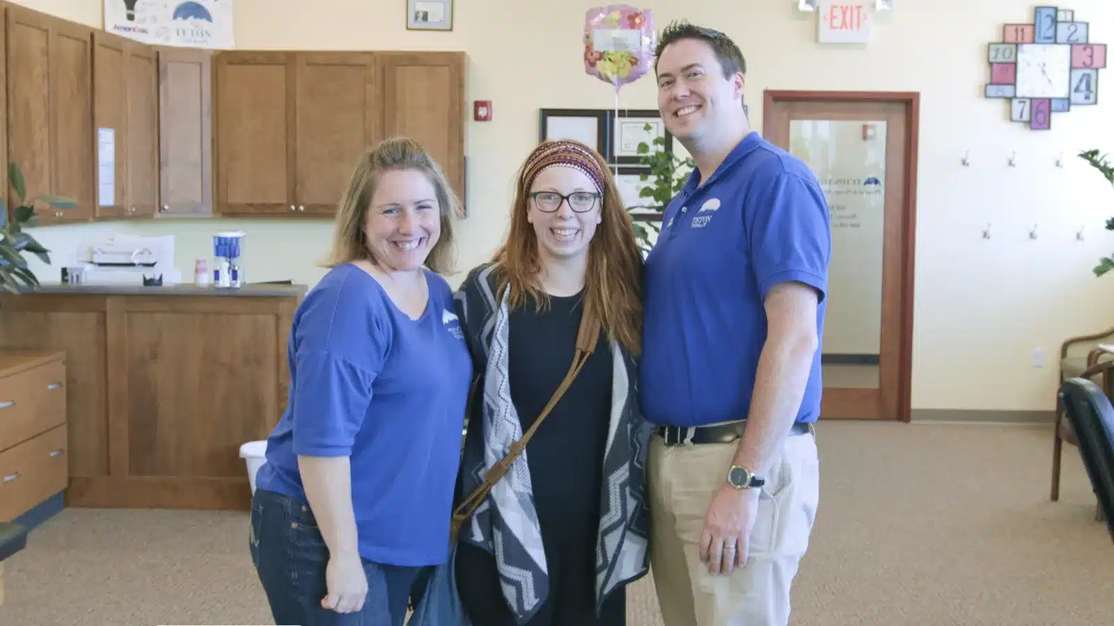 Sheridan small business owners in their office, photographed for social media
